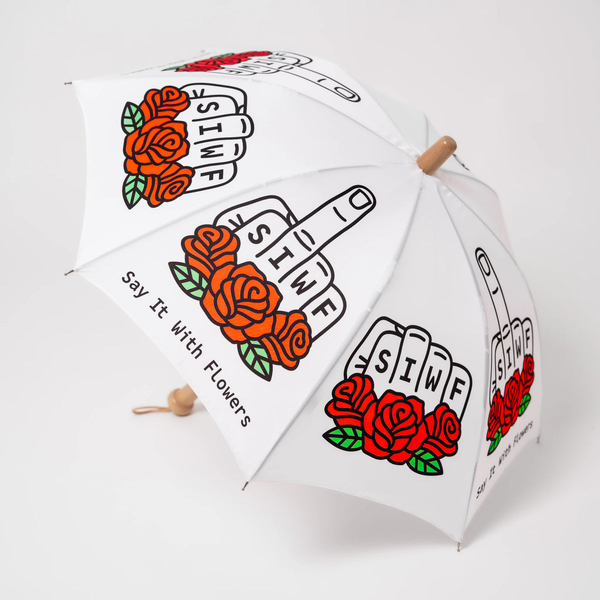 SIWF kids' white umbrella printed with a raised middle finger and red roses