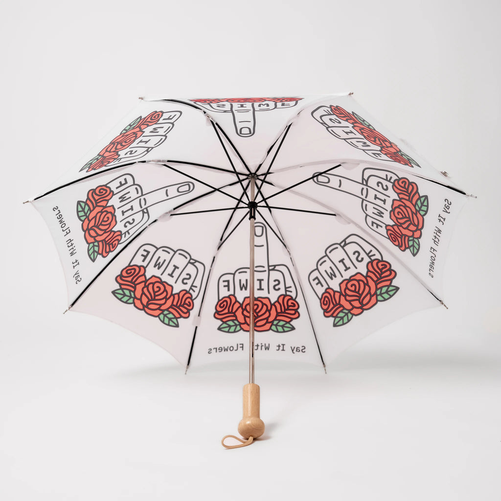 SIWF kids' white umbrella printed with a raised middle finger and red roses